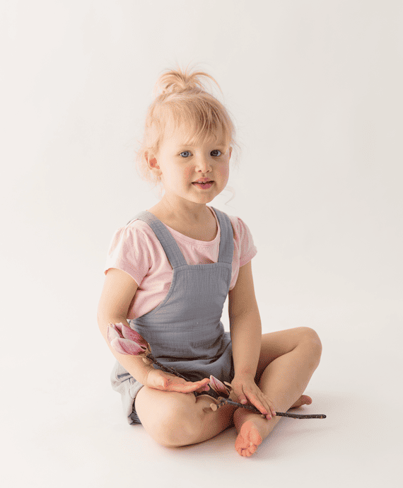Toddlers wearing children's clothing